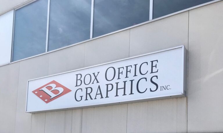 Box Office Graphics sign on the outside of their building.