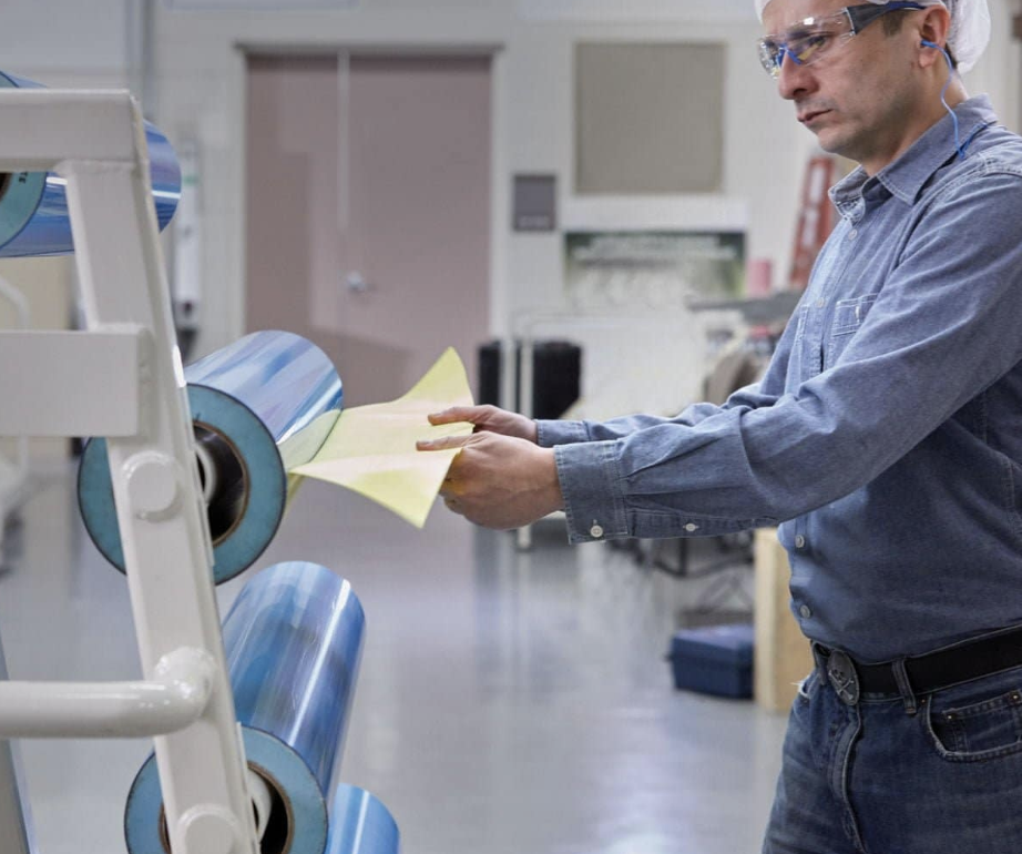 Sticky back tape used in flexographic printing, highlighting its importance for plate mounting.